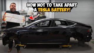 Tearing Apart a Tesla to Save The Rarest Electric Car Made