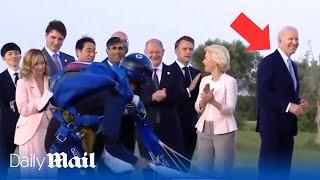 Joe Biden wanders away during G7 parachute display photo op