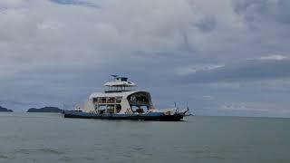 Taking the Ferry from Trat to Koh Chang. $2.18 per car $2.73 a person.