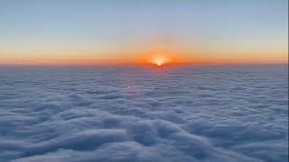 Gorgeous time lapse shows sunrise over clouds roiling like waves in China