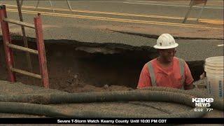 A sinkhole on east Douglas causes problems for drivers business owners and residents