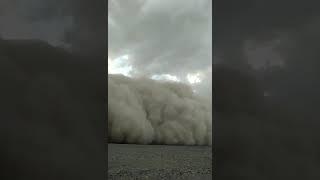 Heavy clouds touching the land surface in Tibet