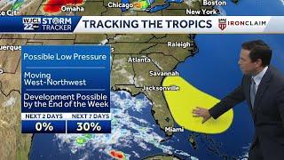 Tracking two areas for tropical development