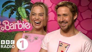 Whats a meme? Margot Robbie and Ryan Gosling on Barbie double waving and dressing as a hamster