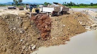 Update Nice Processing Dump Truck Transport Stone Into Deeply Large Pond and Bulldozer Push Stone