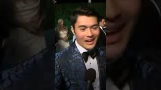 Henry Golding reacts to Will Smith slapping Chris Rock on Oscars stage