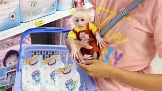 P4. So happy Lucky monkey new life going with mom to buy diapers and milk