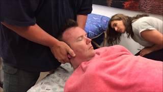 Face massage and scalp massage. Brandon Raynor doing a head massage on Dave Taylor.