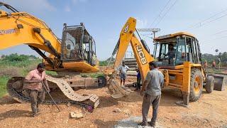 JCB 3DX Helping to JCB 205 Excavator Track Wheel Insert and Chain installation  JCB Excavator