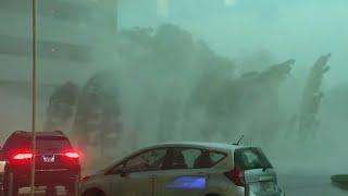 HOUSTON STORMS Resident take cover as windows are blown out on Texas skyscrapers