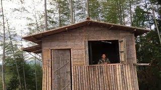 Bushcraft young man build beautiful bamboo house