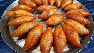 Mug Puli Pitha - সেরা স্বাদের মুগ পুলি পিঠা রেসিপি  Bengali Pithe Puli Recipe  Moong Shamli Pitha