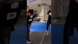 Islam Makhachev training kicks for Charles Oliveira