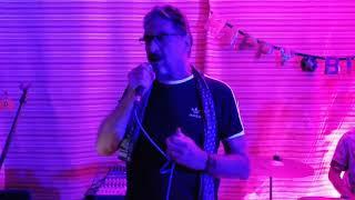 John McAfee singing at his birthday celebration.