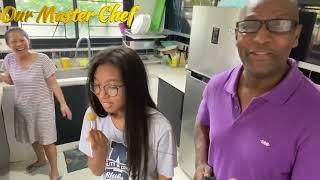 Black American-Filipino couple sharing Fried Mini Balls