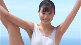 A beautiful sexy Japanese ballerina bewitches by demonstrating yoga exercises. Motivation.