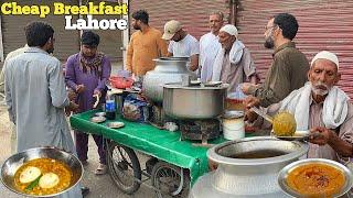 80 YEARS OLD MAN SELLING CHEAPEST HALEEM & CHANAY CHOLAY ON ROAD SIDE  STREET FOOD LAHORE PAKISTAN