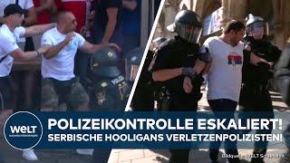 EM 2024 Hooligan-Randale in München Serben prügeln sich mit Polizei nach Pyro-Kontrolle Verletzte