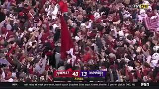 Washington State QB plants flag on Washington logo after Apple Cup win