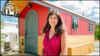 Her cozy vardo wagon is beautiful inside full bathroom