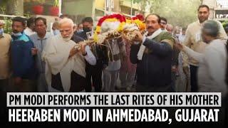 PM Modi performs the last rites of his mother Heeraben Modi in Ahmedabad Gujarat