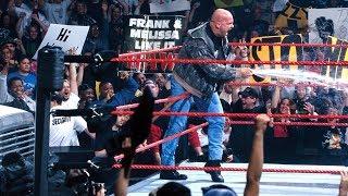 Stone Cold Steve Austin gives The Corporation a beer bath