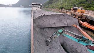 Barge unloading Substituting human labor with excavators for cargo handling.