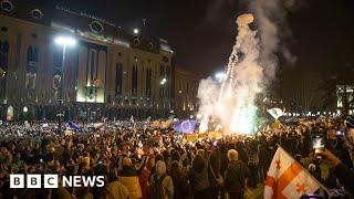 Protests continue in Georgia despite draft law withdrawal - BBC News