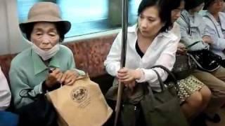 Angry Japanese woman on Tokyo train