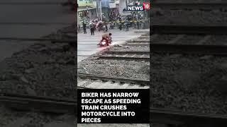Bike Train Accident News  Biker Escapes Deadly Train Accident  #Shorts  CNN News18