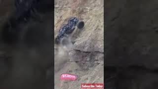 Rock Bouncer Drives Off Cliff