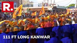 Kanwar Yatra 2022 Shiva Devotees Take Out Massive 111 Feet Long march In UPs Etah