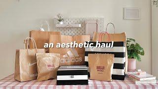 a huge haul   muji lululemon sephora nike..