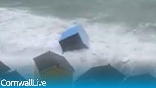 Beach huts washed into the sea as storm batters Cornwall