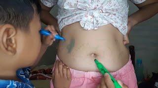 Tution teacher give practical drawing  in her navel to incrse her students extra curricular activity