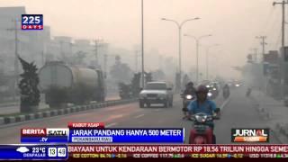 Kabut Asap di Pekanbaru Membuat Jarak Pandang Terbatas