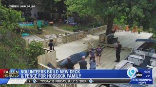 Volunteers build new fence deck for the family of Lt. Hoosock