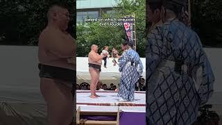 Sumo wrestlers making babies cry in Japan