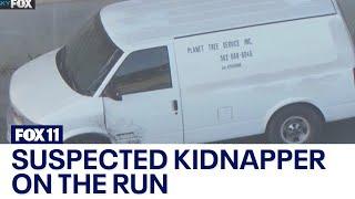 Kidnapping suspect leads police chase ditches white van goes on walk