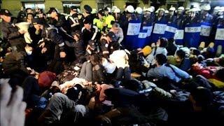 Taiwan riot police retake govt HQ from protesters