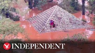 People rescued from rooftops amid catastrophic floods in Brazil