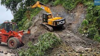 Excavator and Wheel Loader Clearing Ramp and Road Together