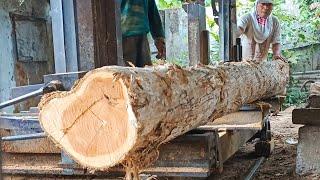 The process of making a beam from teak wood 3.7 meters long