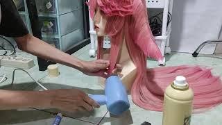 Hairspraying Wig Demonstrations.