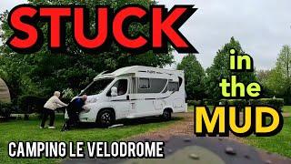 They are STUCK STUCK in MUD at Camping Le Velodrome. MOTORBIKE TRAVEL in FRANCE. PILOTE MOTORHOME.