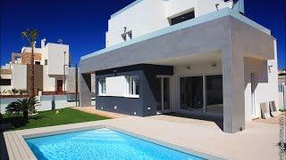 Недвижимость в Испании новая вилла на берегу моря в стиле Hi Tech с бассейном