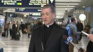 NEW ARCHBISHOP ARRIVES IN CHICAGO