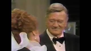 Maureen OHara serenades John Wayne