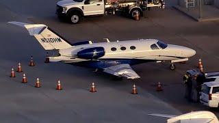 *A pilot had been told to wait to take off before planes collided on Houston runway NTSB says