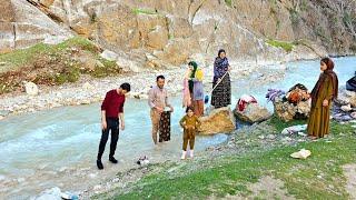 Helping Parvaz family Ali and his wife by the river 2024